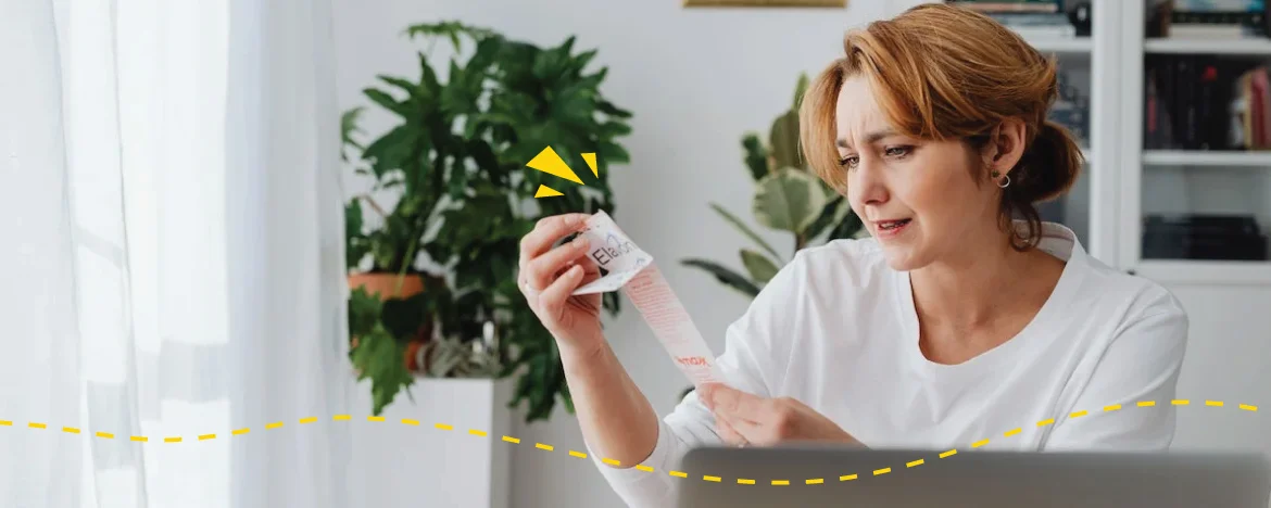 Woman checking her reciepts