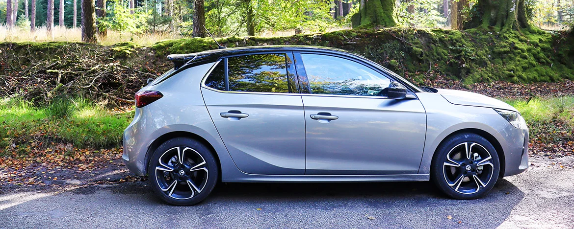 Vauxhall Corsa parked in forest 