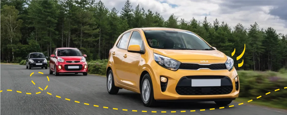 Three Kia Picanto cars