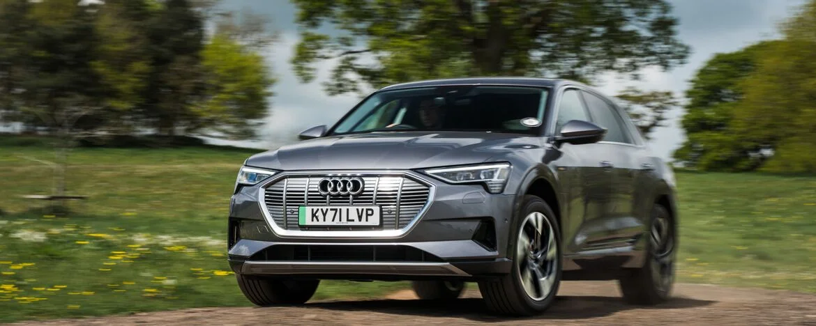 Audi e-tron Sport 50 Quattro driving around corner