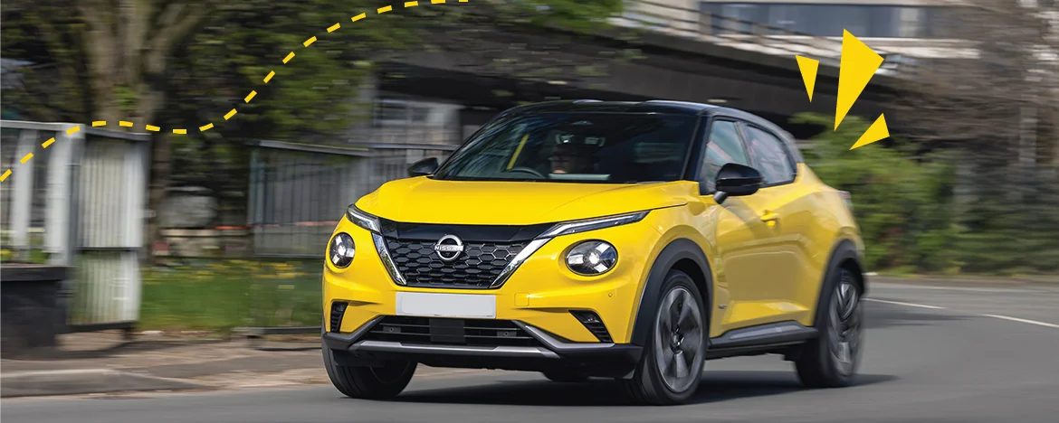 Parked Nissan Juke in yellow, with yellow accents