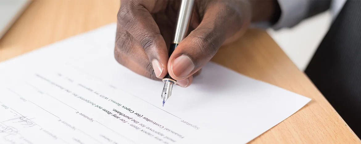 Man signing a contract