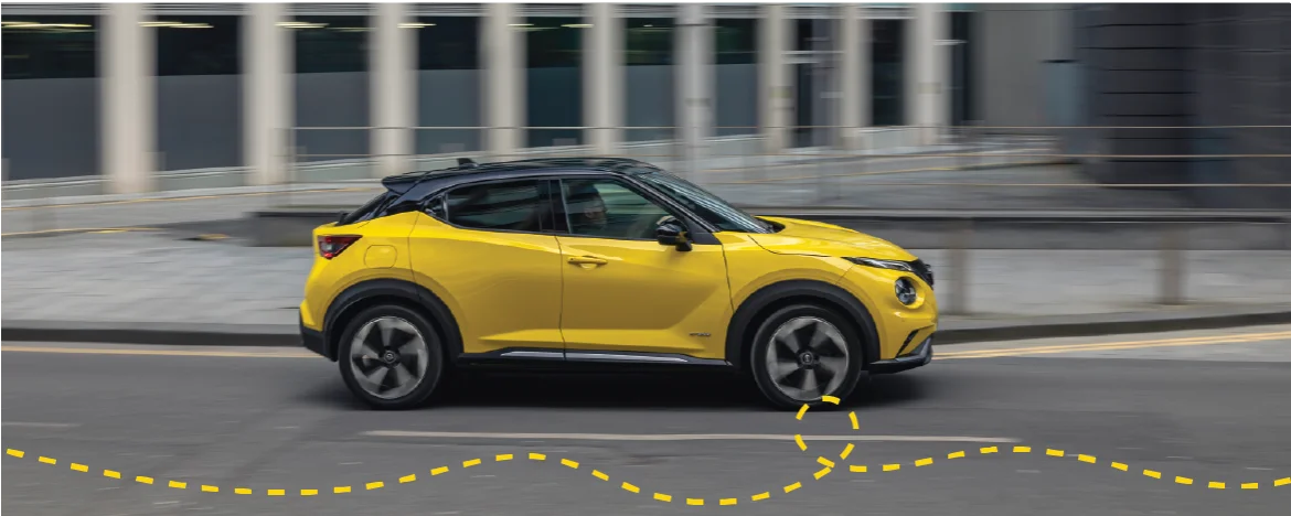 The Nissan Juke on the road, with yellow accents