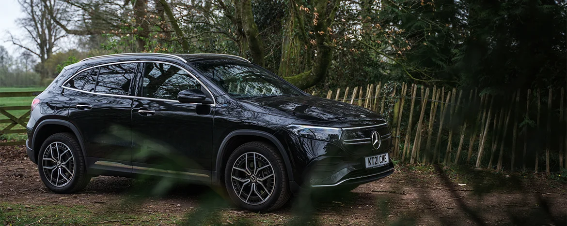 Mercedes-Benz EQA 250 Sport parked in woodland area