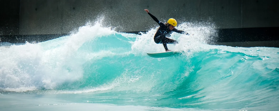 Young boy surfing at The Wave