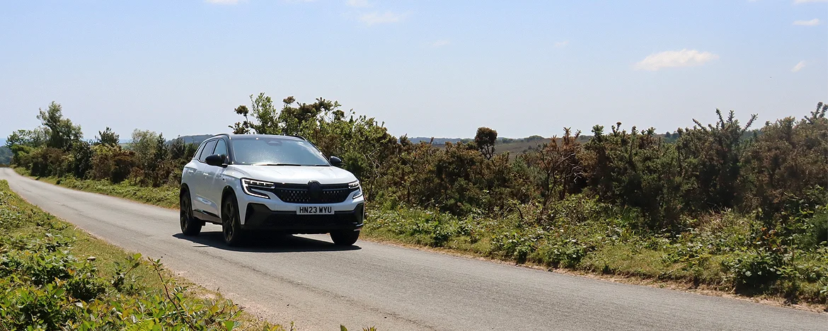Renault Austral E-Tech driving on country road