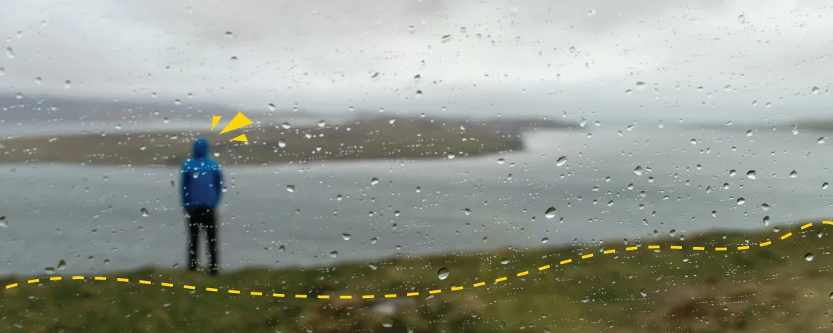 person standing in the distance raining 
