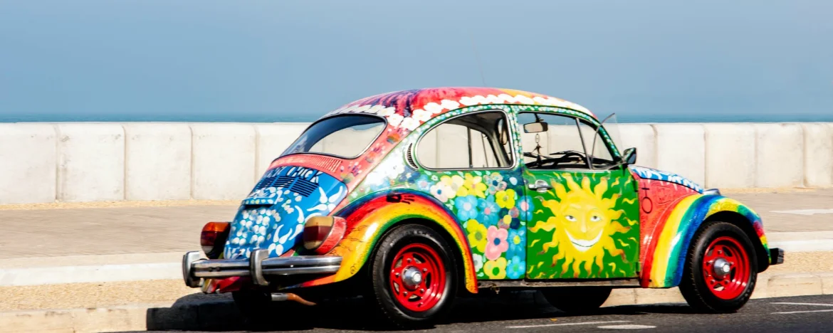 Volkswagon Beetle painted in very bright colours.