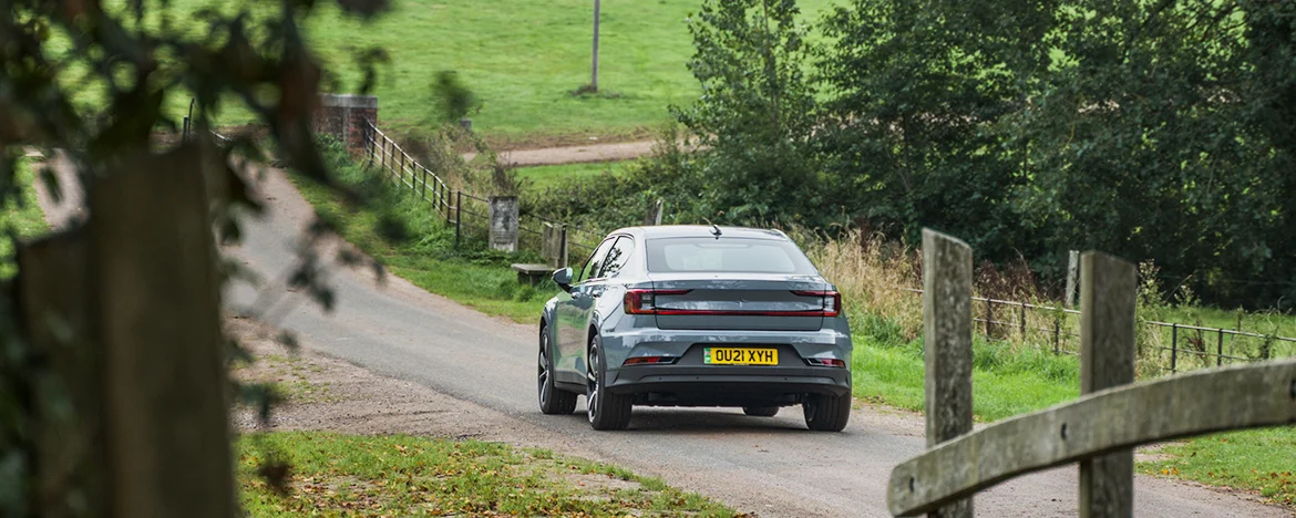 Polestar 2 driving rear shot