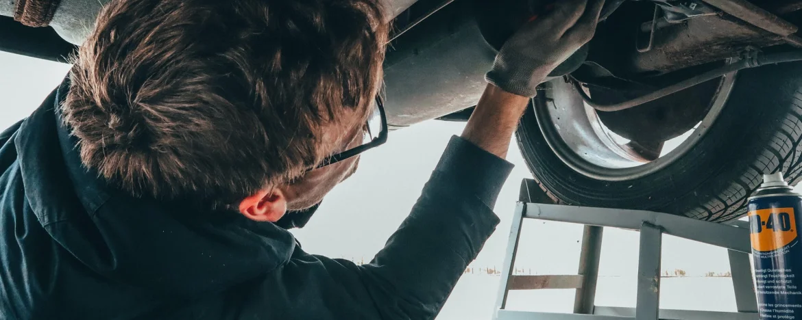 Mechanic fixing a car