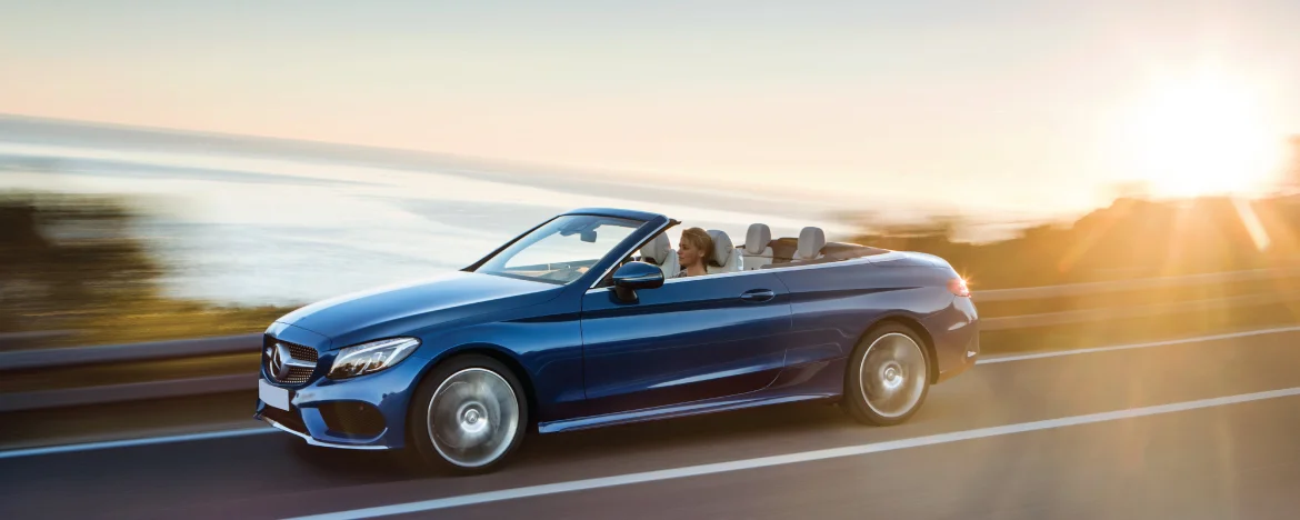 Mercedes C-Class Cabriolet drving in sun