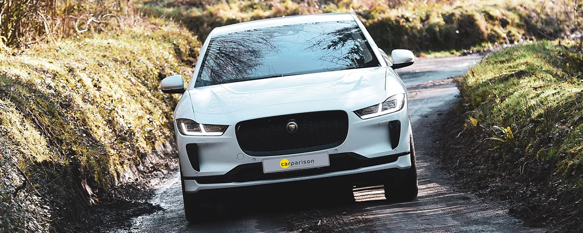 Jaguar I-Pace driving through countryside lane