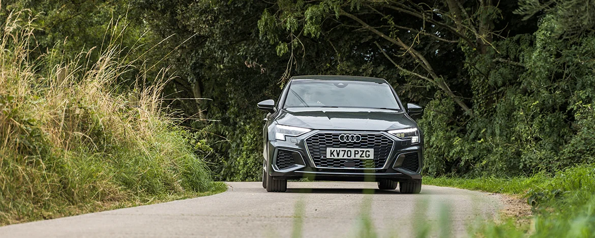 Audi A3 TFSI 40 e driving around a corner