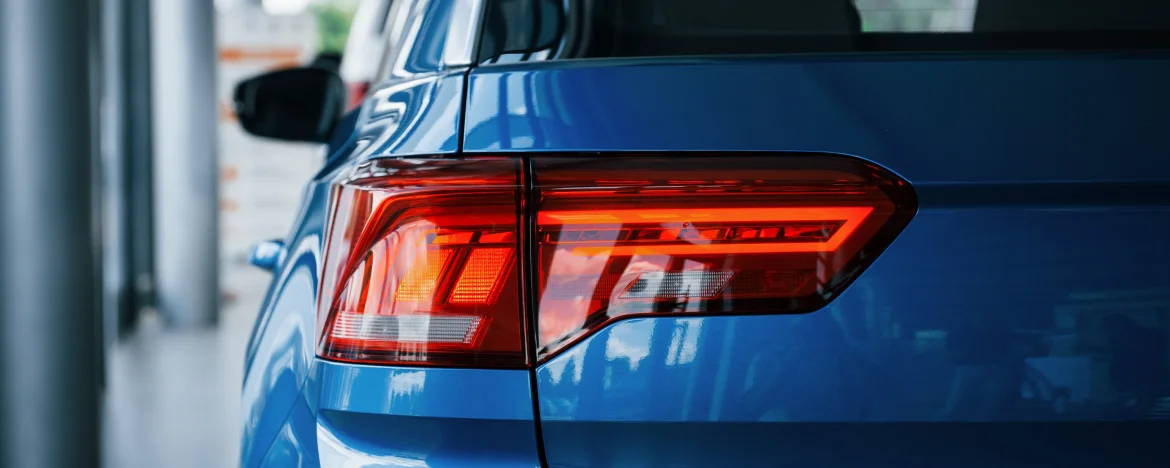 Close-up of new car in showroom