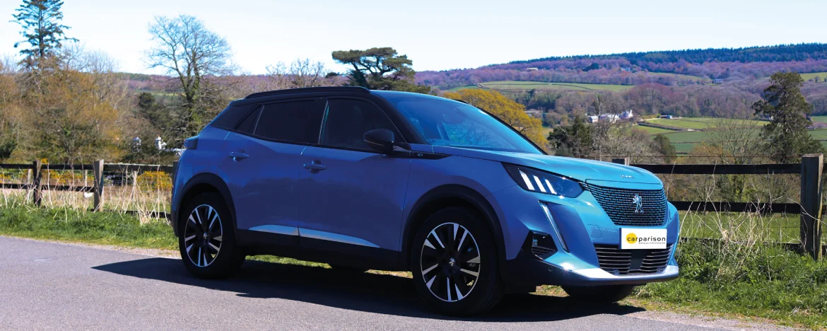 Peugeot e-2008 parked in countryside