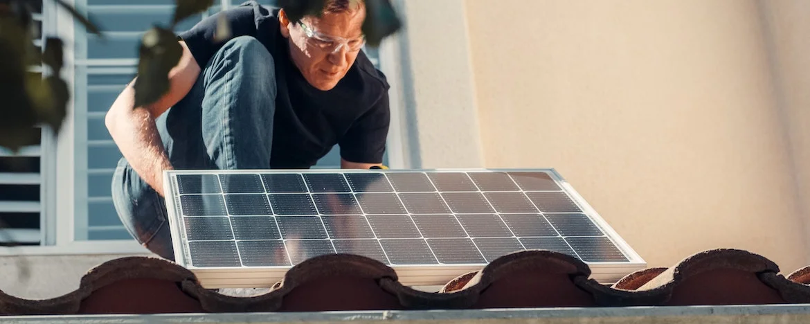 Solar panels being installed on a roof