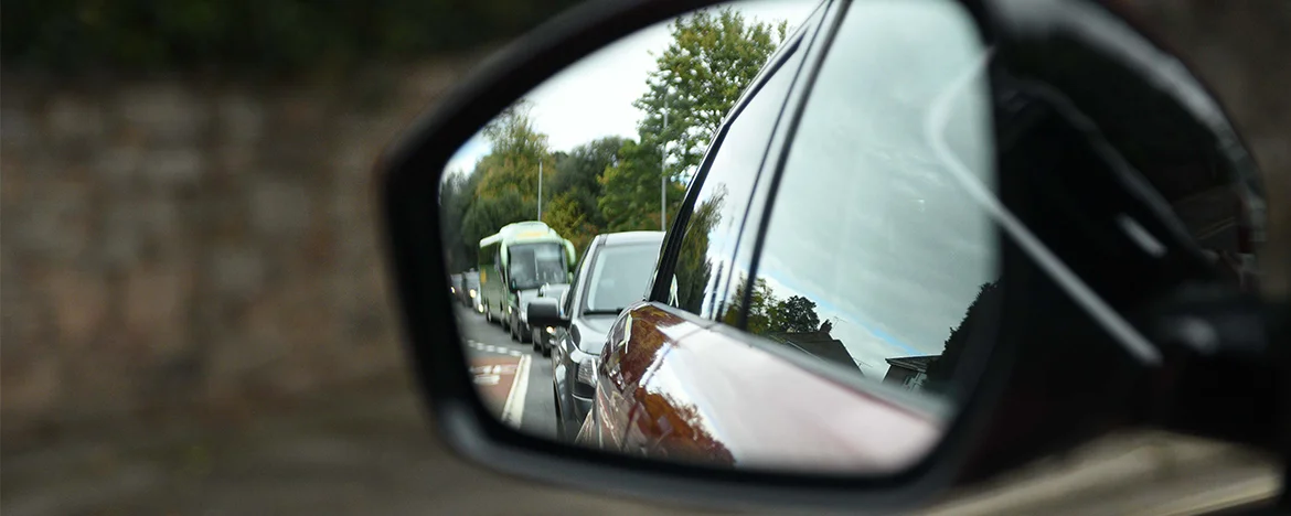 queing-traffic-seen-through-mirror