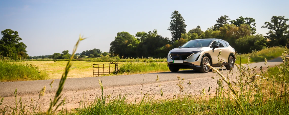 nIssan aryia in a field