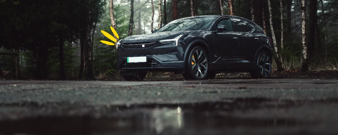 Polestar 2 in wet forest