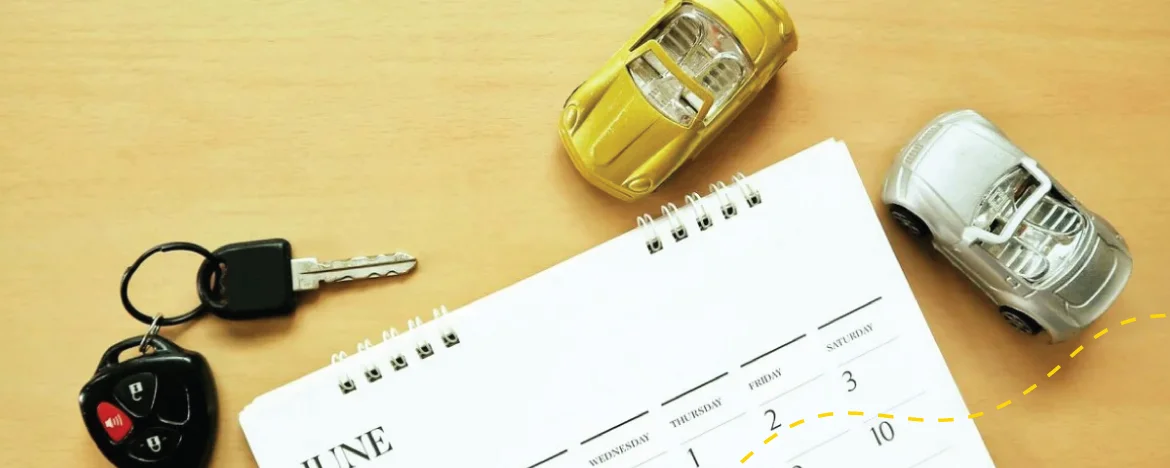 Car keys, toy cars, and calendar
