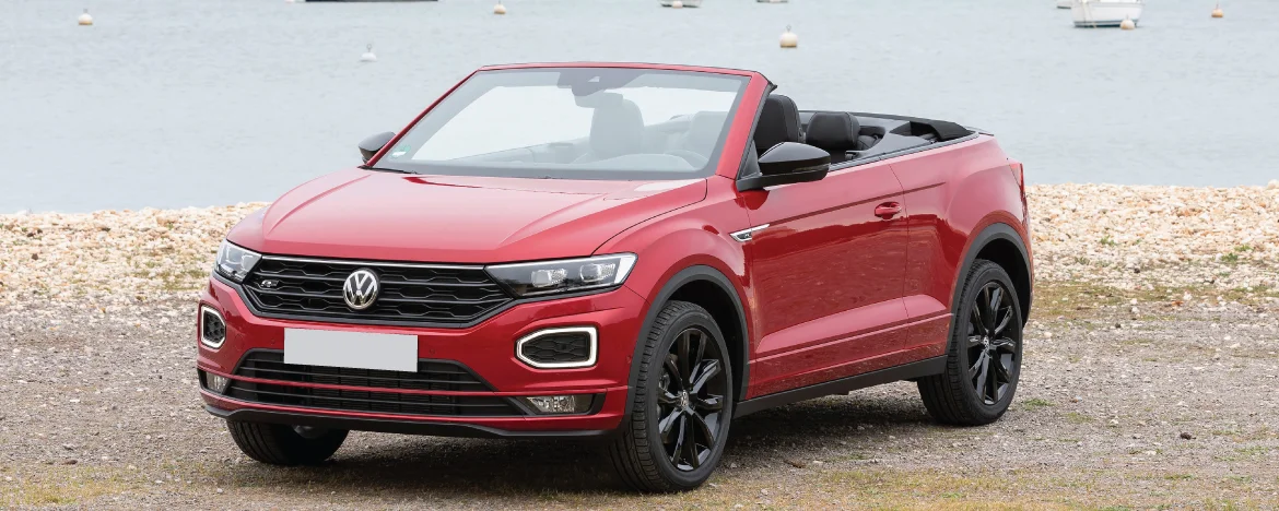 Volkswagen T-Roc Cabriolet parked by harbour 