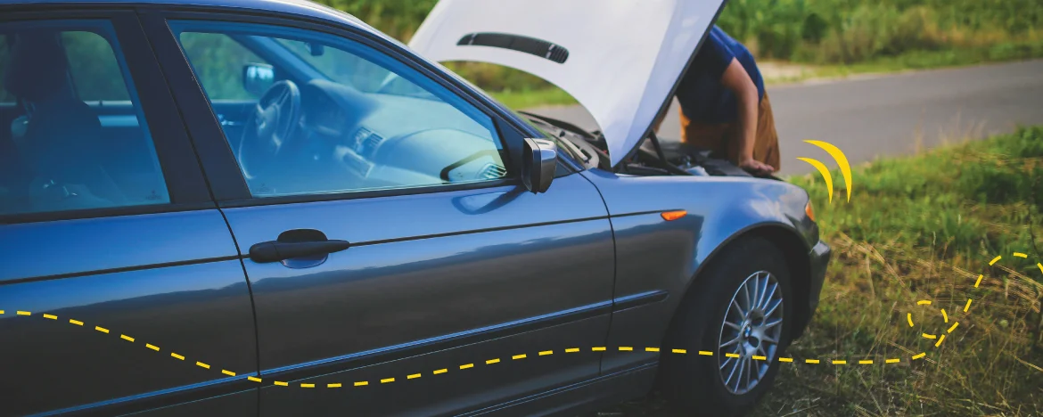 person fixing car