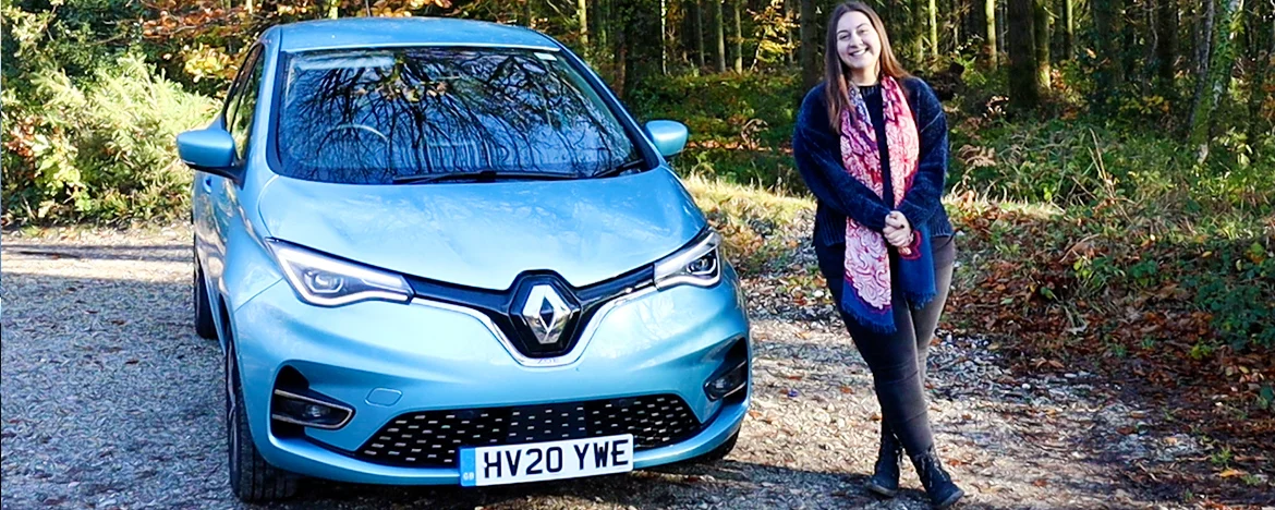 Woman stood next to Renault ZOE