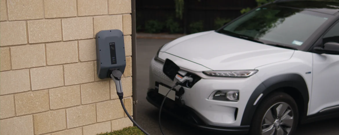 Electric car charging at the wall 