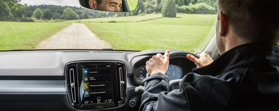 Man driving Volvo XC40