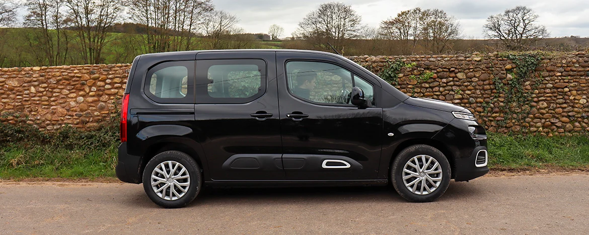 Citroen Berlingo parked in the countryside