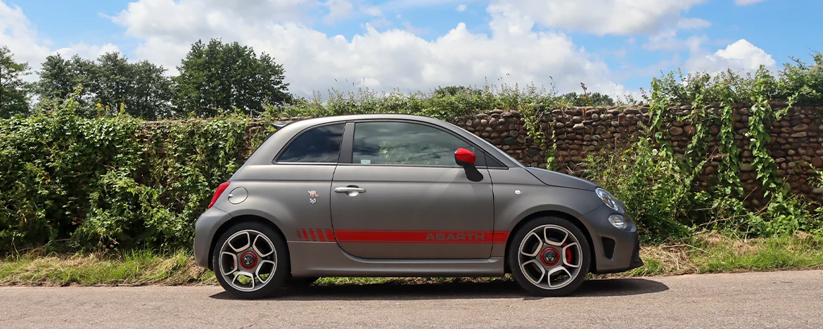 Abarth 595 parked on hill