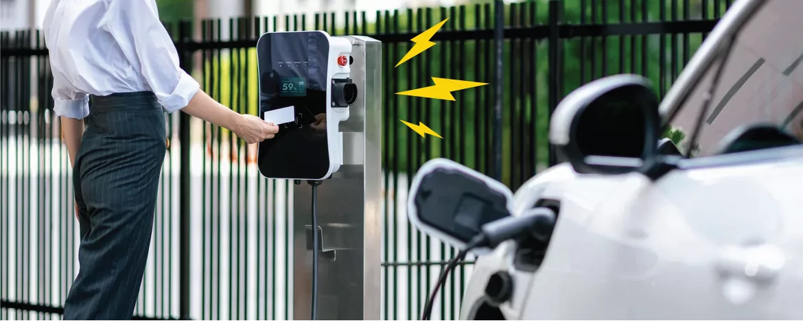 Person charging electric car