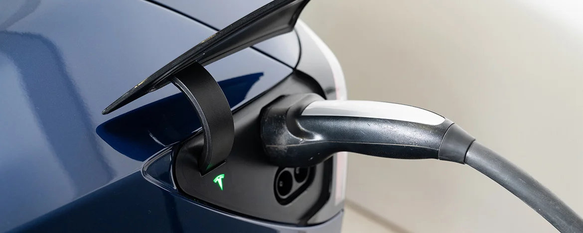 Close-up image of Tesla Electric Vehicle charging point
