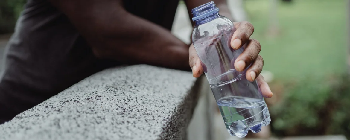 Man holding a bottle of water 