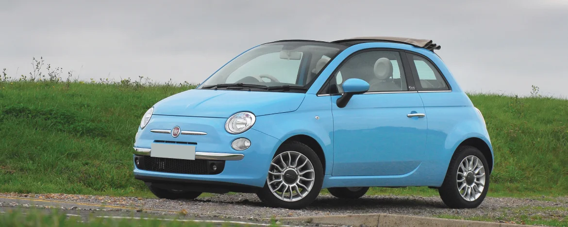 Fiat 500C parked in country 