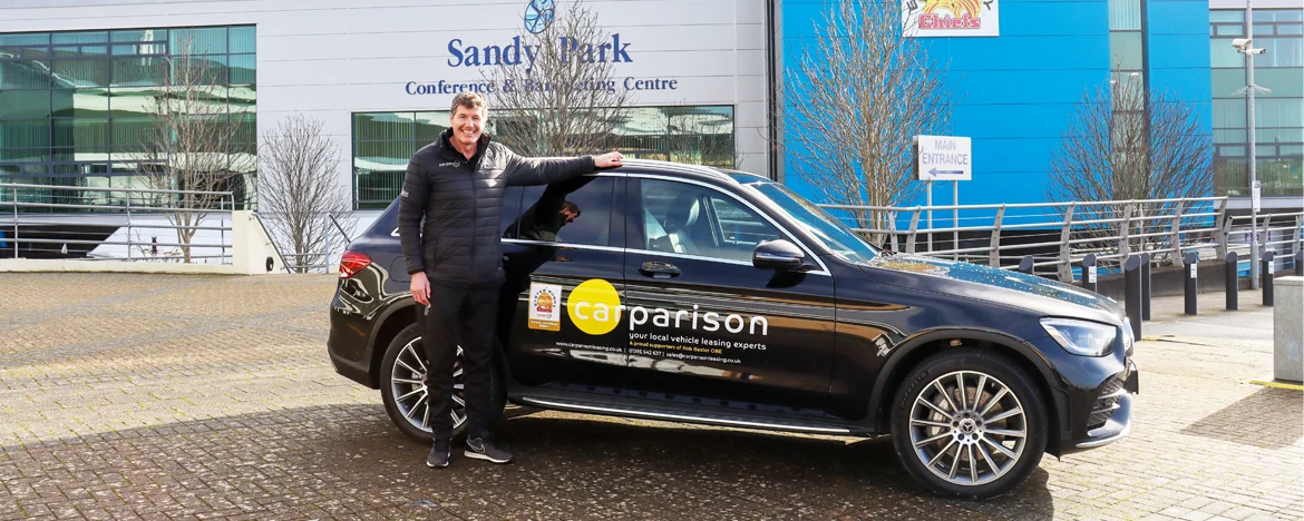 Rob Baxter stood next to Carparison branded GLC