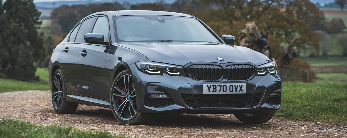 BMW 330e parked on hill