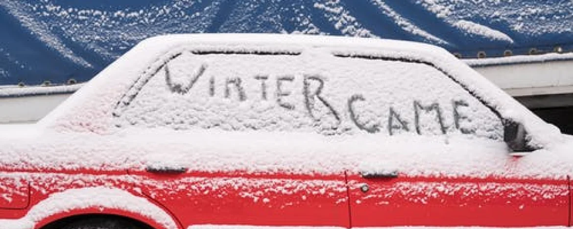 Snow covered car