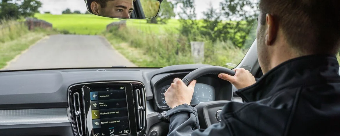 Man driving Volvo XC40