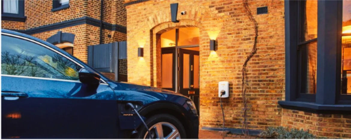An electric car charging at home
