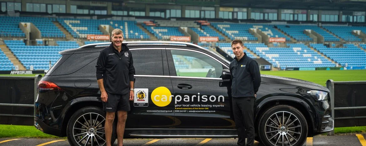 Rob Baxter with branded car