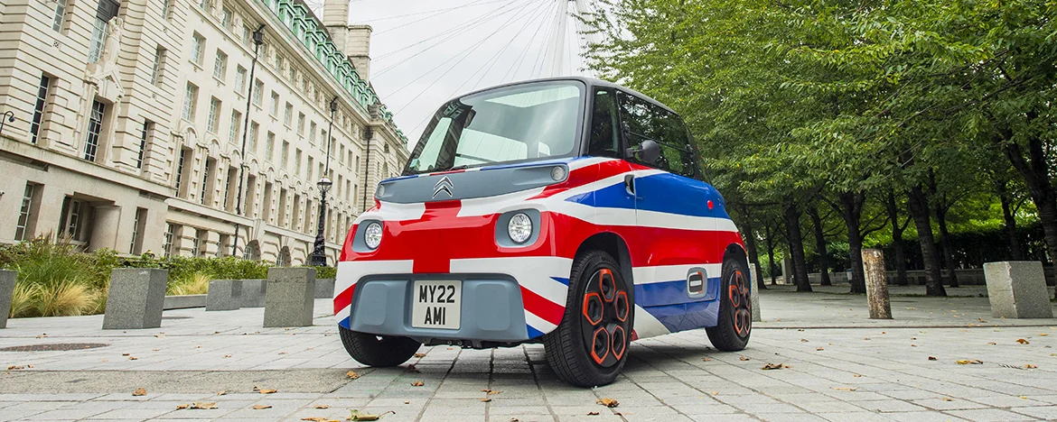 Citroen Ami parked beneath London Eye