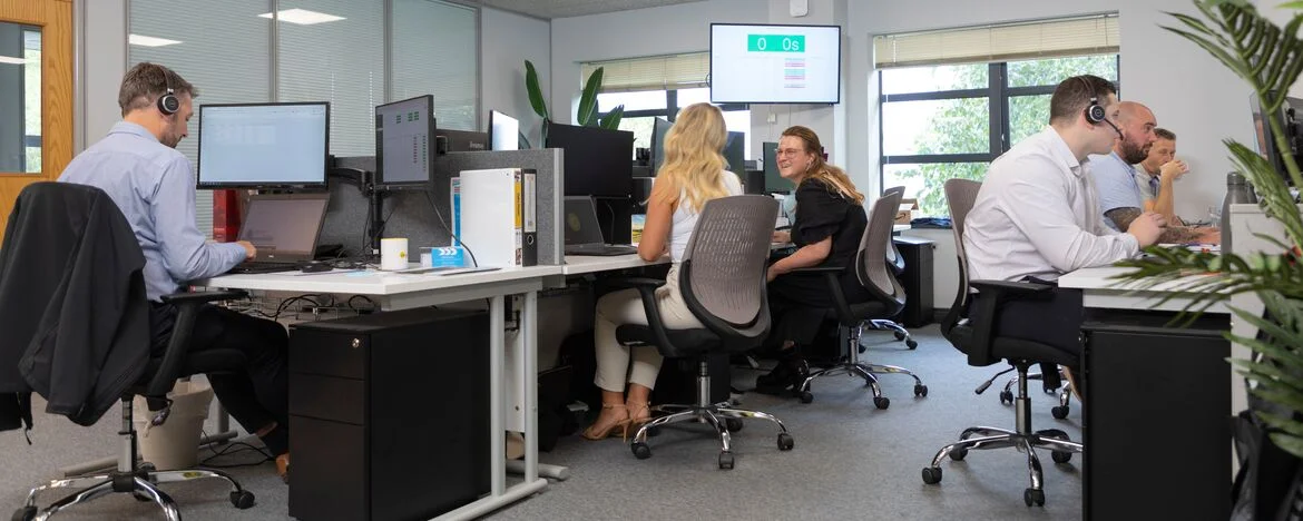 Carparison staff in office