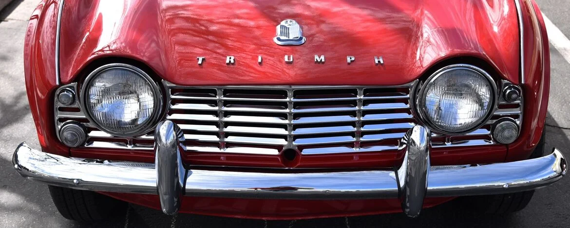 Classic Triumph car in red