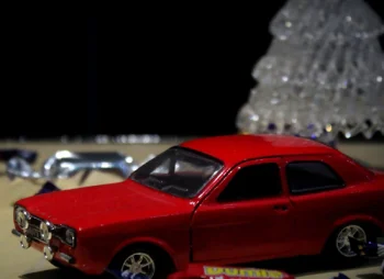 Car toy by christmas tree