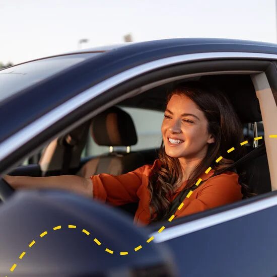 Smiling woman in drivers seat