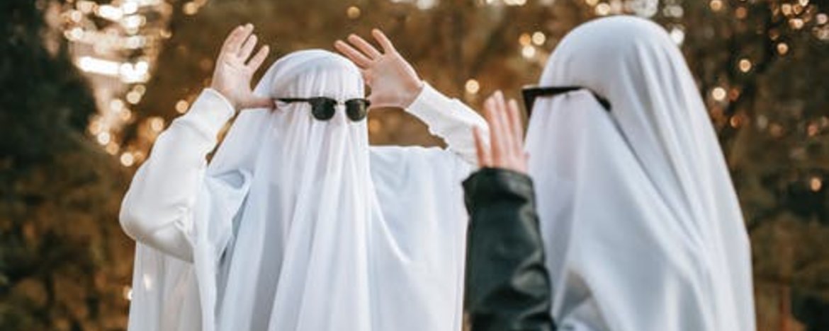 People dressed as ghosts