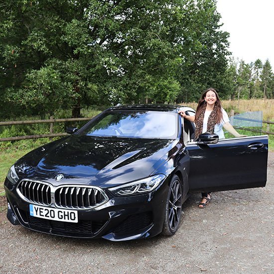 woman with bmw 8 series